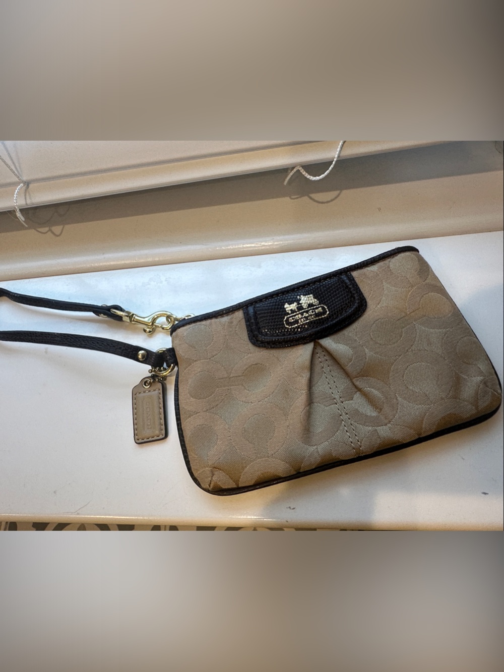 Coach Beige Signature Wristlet with Black Trim and Gold Hardware